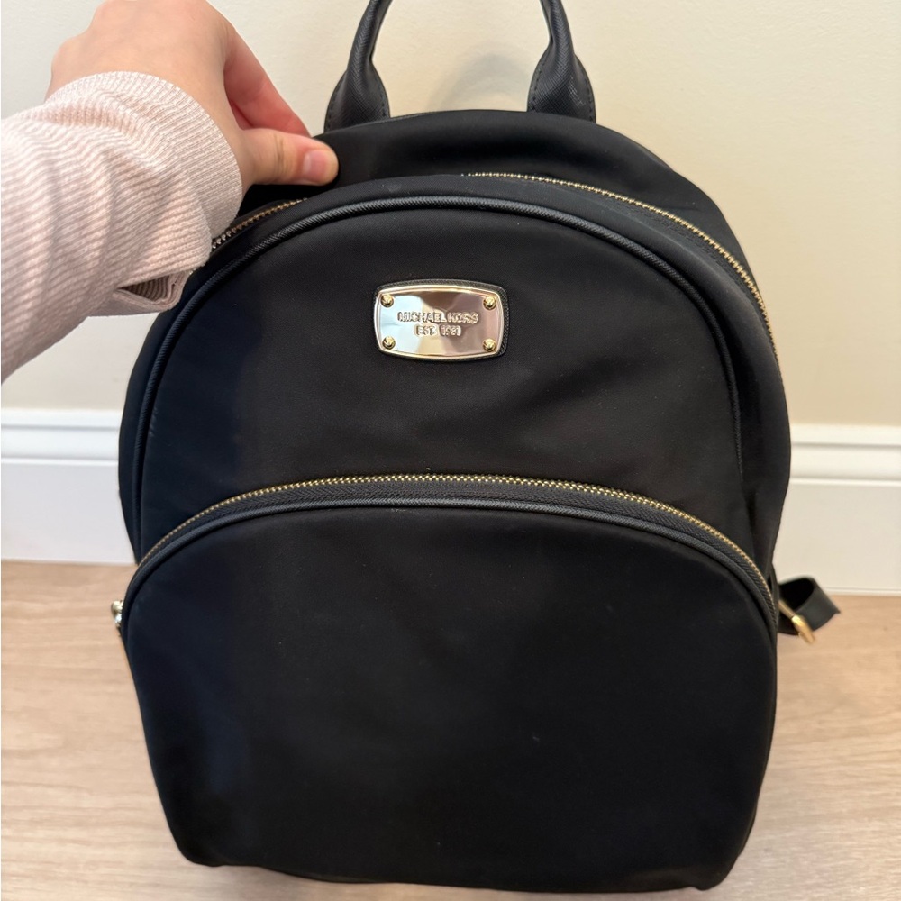 Michael Kors Black Backpack with Gold Logo